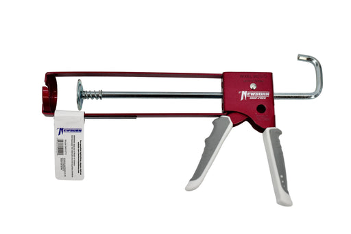A red and silver caulking gun with white handles and a white product tag attached, photographed on a plain light background.